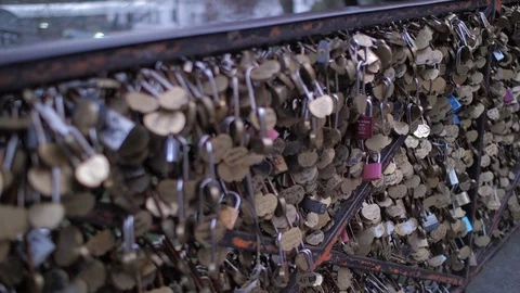 Love locks in Paris close up 4K shallow depth of field at sunset Stock Footage 126164874