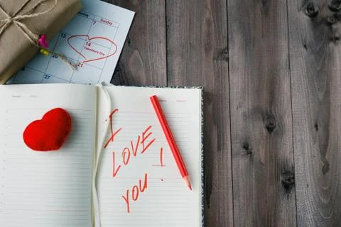 Love message on grunge wooden table. 스톡 사진