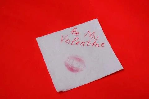 Love message left on red table, valentine concept Stock Photos