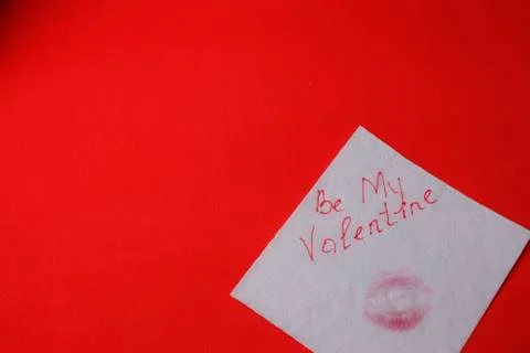 Love message left on red table, valentine concept Stock Photos