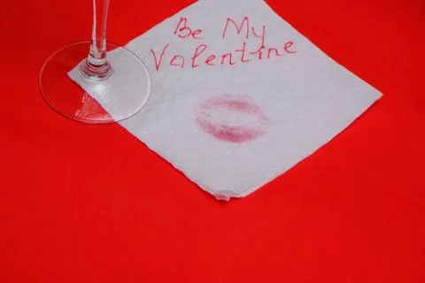 Love message left on red table, valentine concept Stock Photos