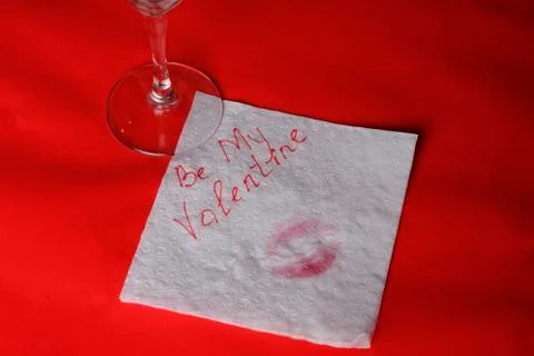 Love message left on red table, valentine concept Stock Photos
