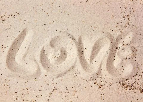 Love message in the sand Stock Photos