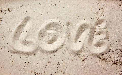 Love message in the sand Stock Photos