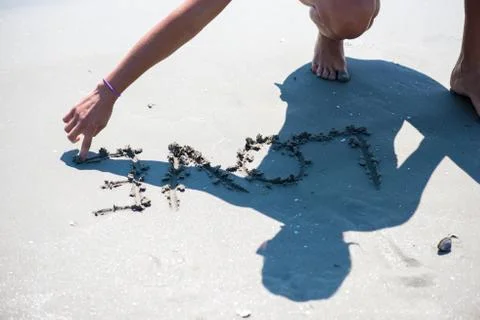 Love message written in sand Stock Photos