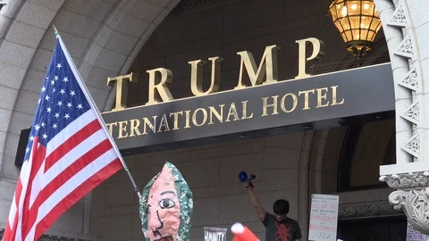 Love, Not Hate... chant at Trump Hotel during Jan. 29 protest Stock Footage