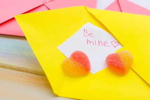 A love note in a yellow envelope Stock Photos