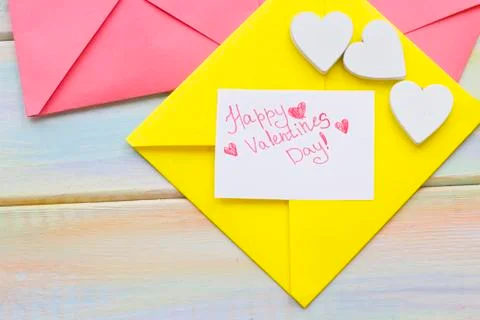 A love note in a yellow envelope Stock Photos