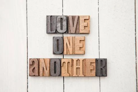 "Love One Another" Spelled in Type Set Foto stock