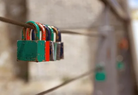 Love padlocks on the railing of a bridge. Stock-Fotos