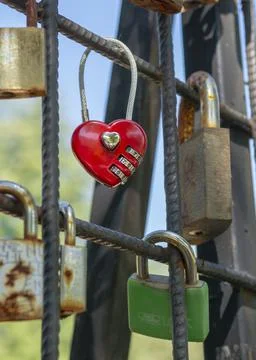 Love padlocks representing ever lasting love. Red heart love lock. Stock Photos