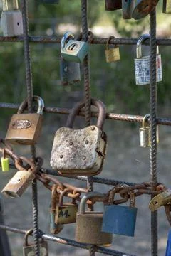 Love padlocks representing ever lasting love. Detail. Close up. Stock Photos