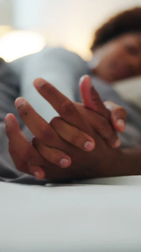 Love, rest or couple on bed with holding hands, partner trust or bonding Stock Footage 340812437