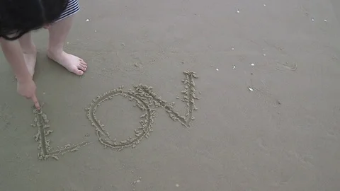 Love on the sand Stock Footage 76279259