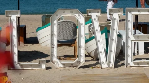 LOVE sign located at the beach Video stock 294285815