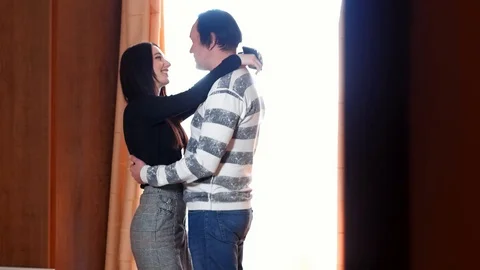 A love story between an Asian man and a European woman, an Asian guy with long Stock Footage 99511368