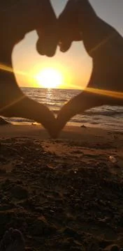 Love at sunset Stock Photos