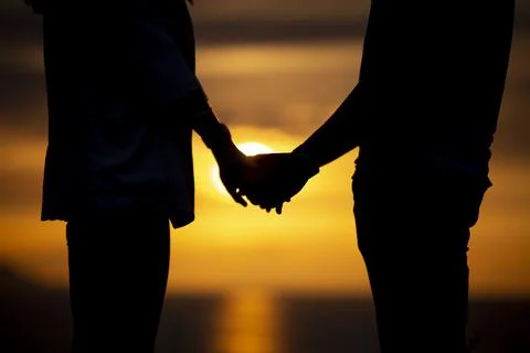 Love in sunset Stock Photos