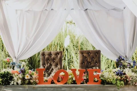 Love table setup, wedding guest table, reception layout rustic and vintage Stock Photos