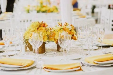 Love table setup, wedding guest table, reception layout rustic and yellow Stock Photos