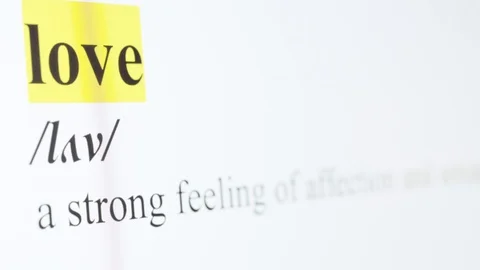 Love Text Macro Shot Highlighted in Yellow Color On Computer Screen Stock Footage 123224347