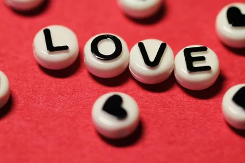 Love text on red Stock Photos