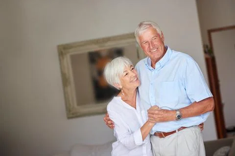 Love is what makes the ride worthwhile. a happy senior couple at home. Stock Photos
