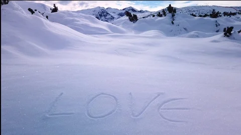 Love Written in Snow on a Mountain, 4K Stock-Footage 123706109