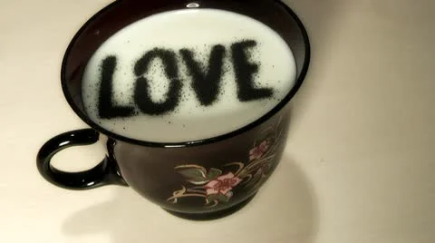 Love,character in a cup of milk. Stock Footage 8990507