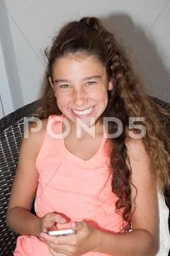 Lovely and cute is smiling girl outside Stock Photos