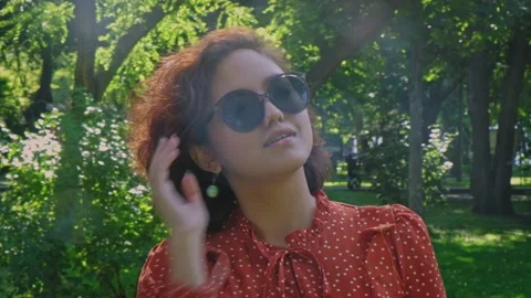 Lovely Asian woman with short curvy hair... | Stock Video | Pond5