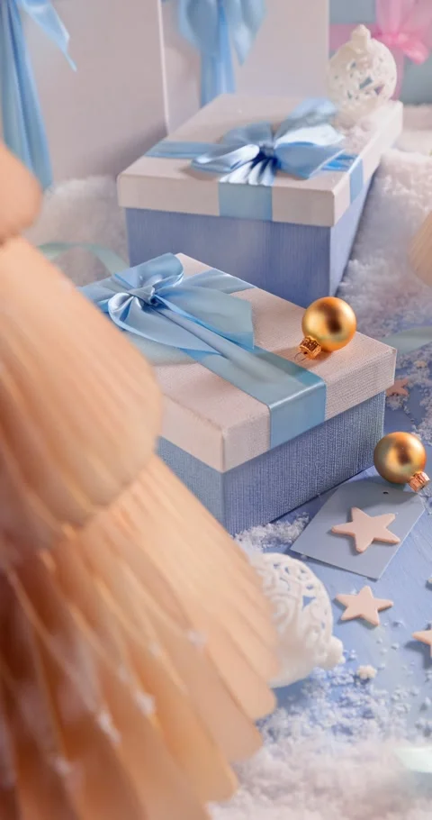 Lovely blue festive gift box with ornaments and baubles. Stock Footage 346555987