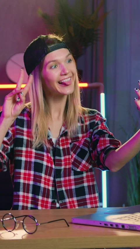 Lovely cheerful satisfied light-haired 25-aged girl in casual clothes in cap wit Stock Footage 329504265