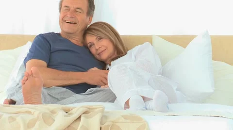 Lovely couple in the bed Stock Footage 2103496