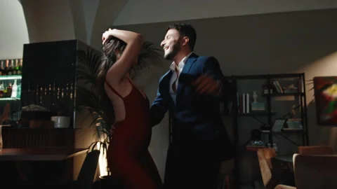 Lovely couple dancing at evening Stock Footage 234510213