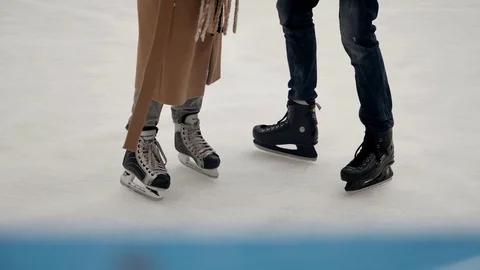 Lovely couple skiing on the ski rink Stock Footage 129679953