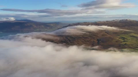 Lovely Flight Over clouds Cooley Mountains, Co Louth, Ireland Stock Footage 231717199