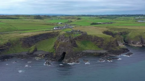 Lovely Flight over Dunluce Castle, Antrim, Northern Ireland Stock Footage 232423609