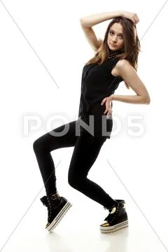 Lovely girl in casual style clothing, isolated Stock Photos