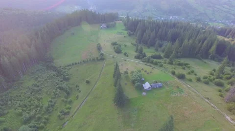 Lovely house in a mountain forest. aerial view Stock Footage