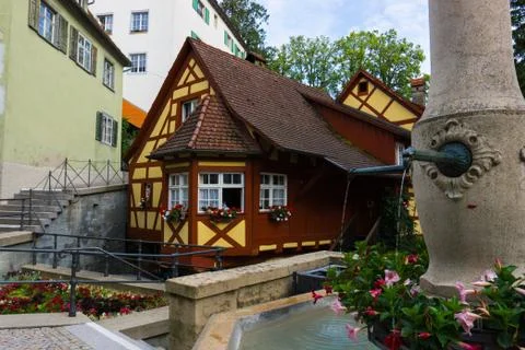 Lovely medieval, German house and fountain. Stock Photos