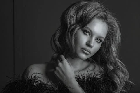 Lovely model with professional makeup, posing in the shadows Stock Photos