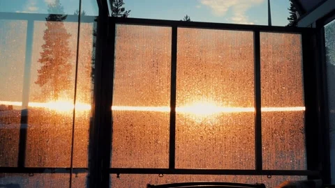 Lovely Sunset Through A Window Stockbeeldmateriaal 169793146