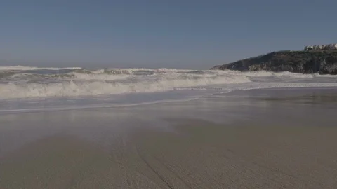 Lovely waves in sandy beach slow motion 库存影片 100521016