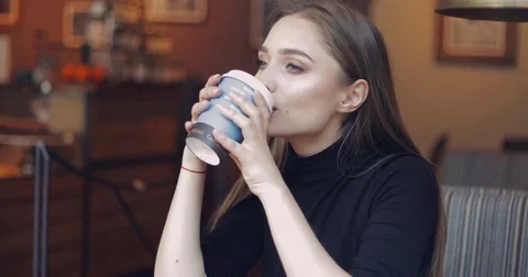 Lovely woman posing with coffee Stock Footage