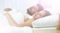 The lovely woman sleeping near the man on the bed 4k or 4k+ Resolution