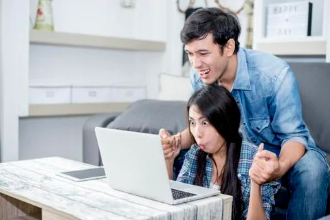 Lover are surprising when using the laptop. Family concept, Lovers concept, T 写真素材