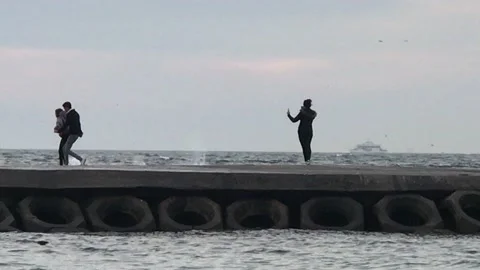 Lover having fun with sea waves Video stock 146411885