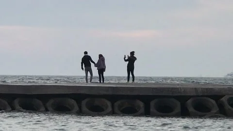 Lover having fun with sea waves Video stock 146412247