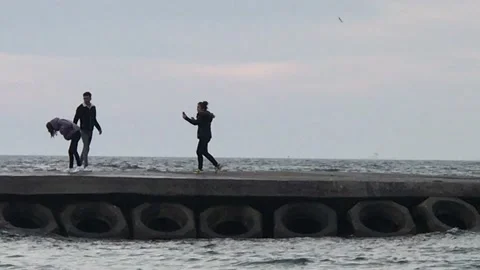 Lover having fun with sea waves Video stock 146412488